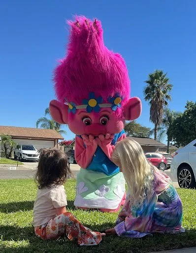 Pink Troll party character in San Jose